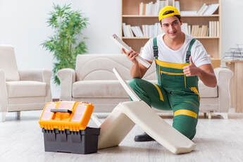 Furniture repair service provide by a man